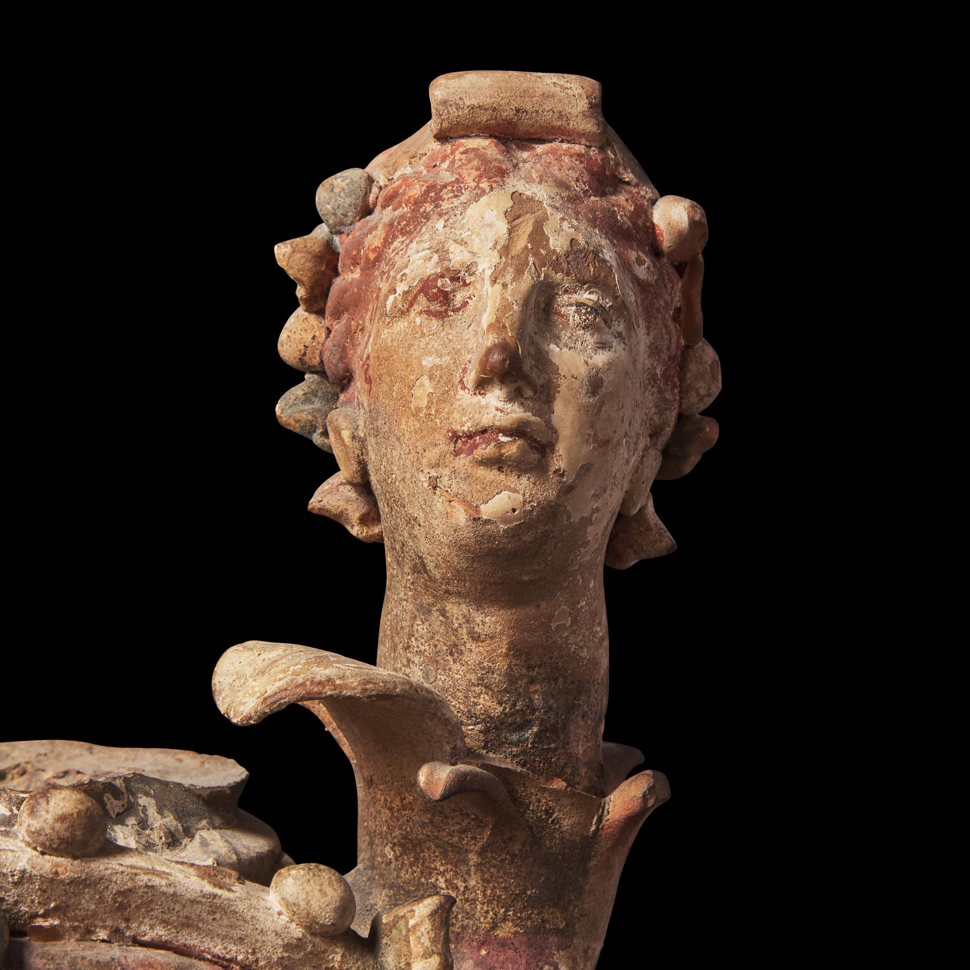A Canosan Painted Terracotta Votive Vessel