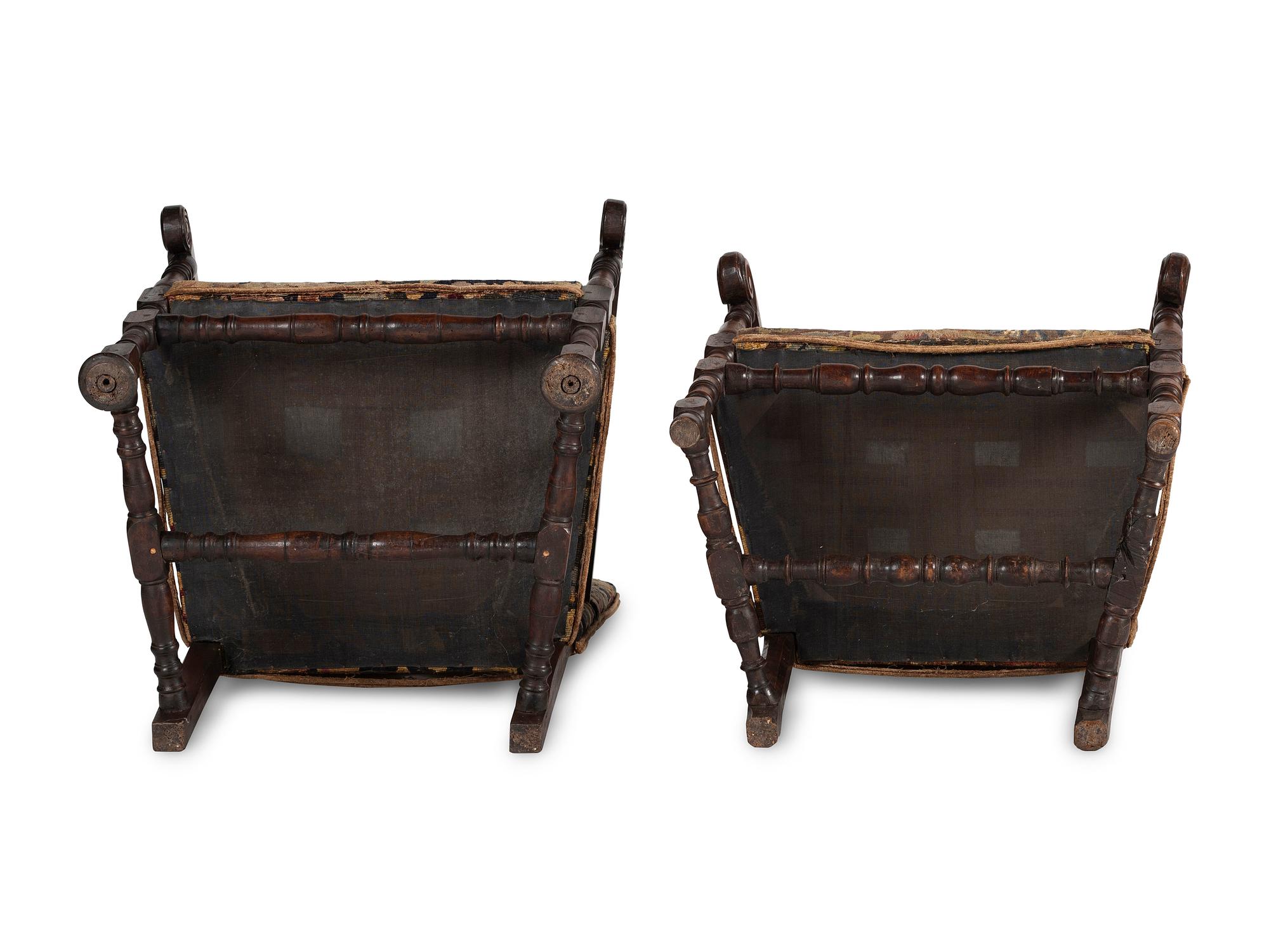 A Matched Pair of French Scroll-Carved and Turned Walnut Tapestry Upholstered Fauteuils