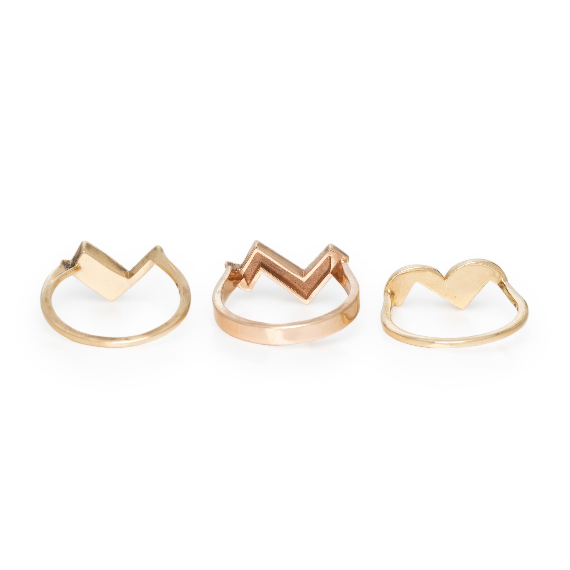 COLLECTION OF THREE YELLOW GOLD STACKING RINGS