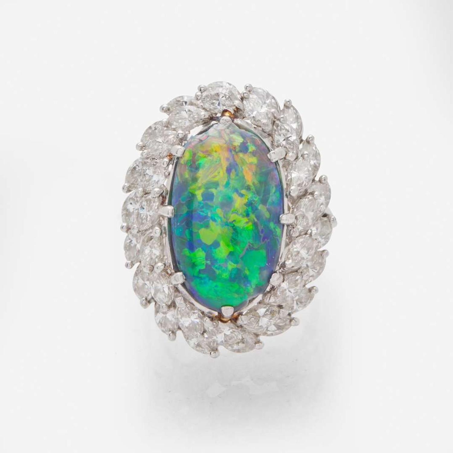 A Platinum, Black Opal, and Diamond Ring