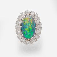 A Platinum, Black Opal, and Diamond Ring
