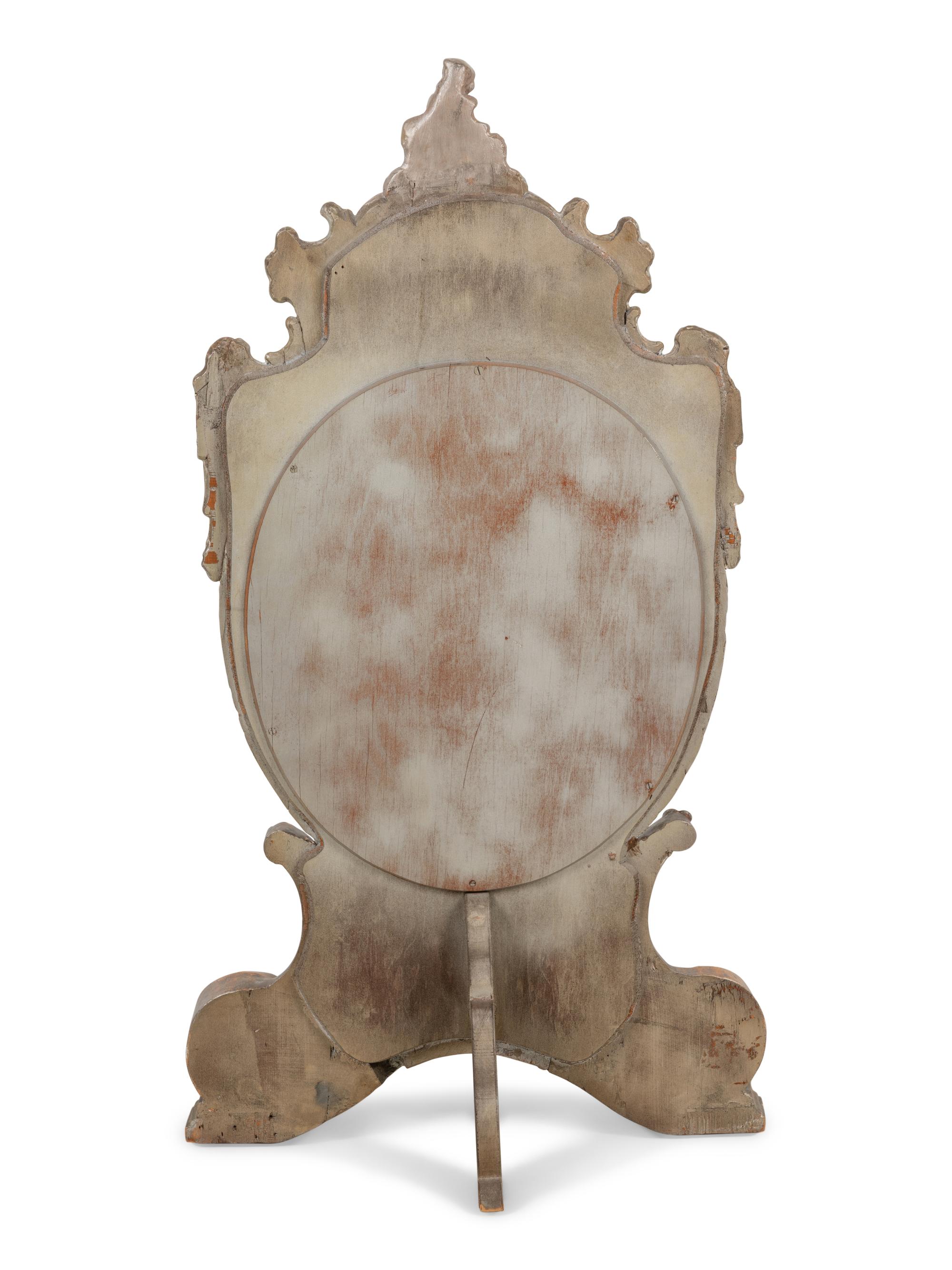 An Italian Silvered and Giltwood Dressing Mirror
