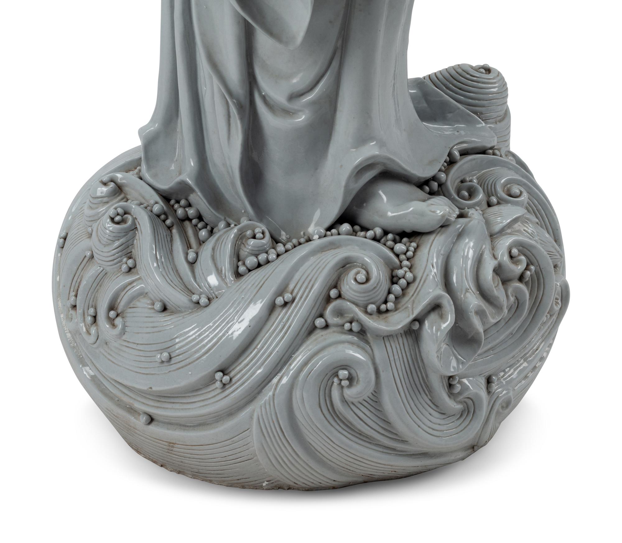 A Large Blanc de Chine Figure of Guanyin