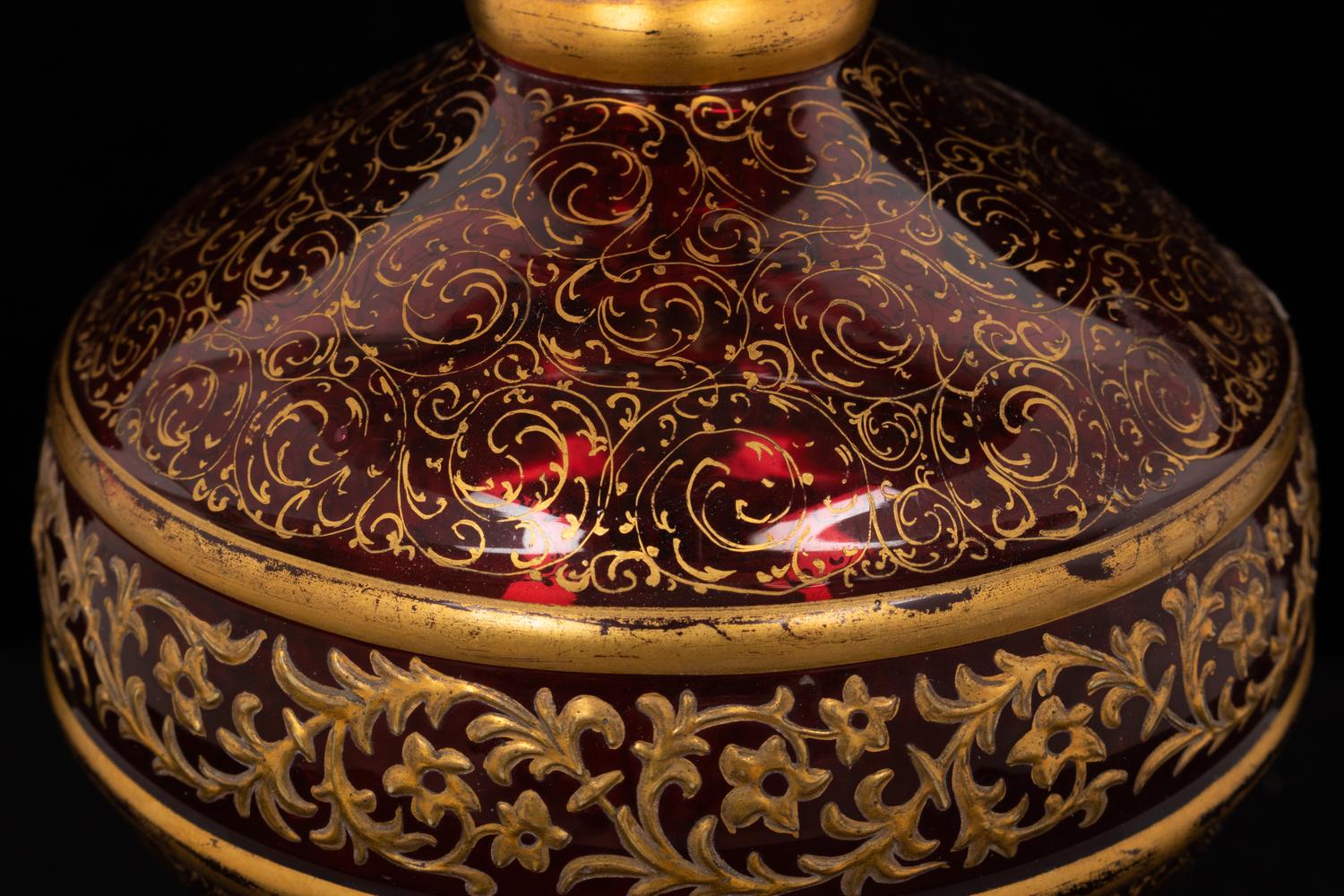 A Persian Market Gilt Decorated Cranberry Glass Vase