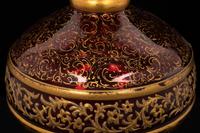 A Persian Market Gilt Decorated Cranberry Glass Vase
