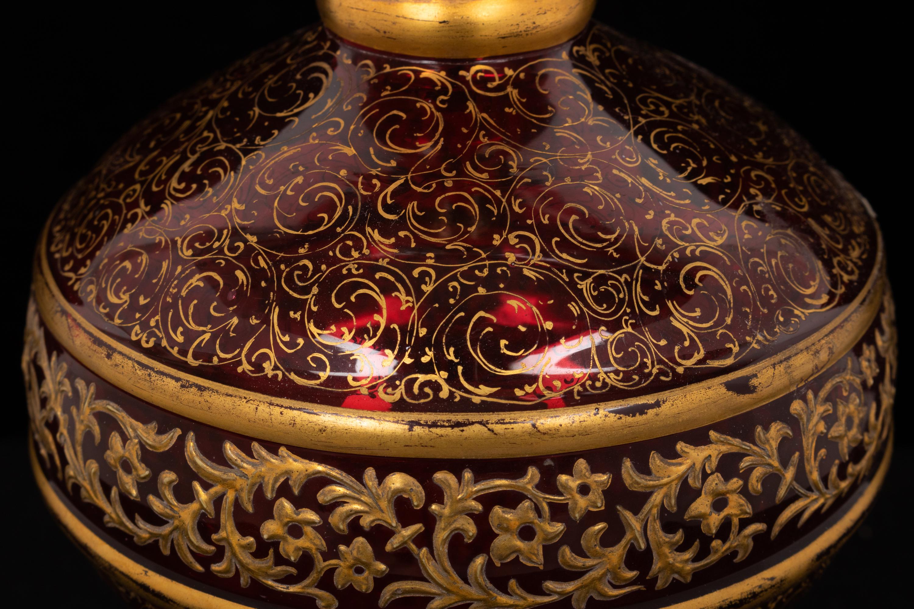 A Persian Market Gilt Decorated Cranberry Glass Vase