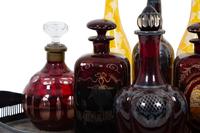 Eight Colored Glass Decanters and a Silver-Plate Galleried Serving Tray