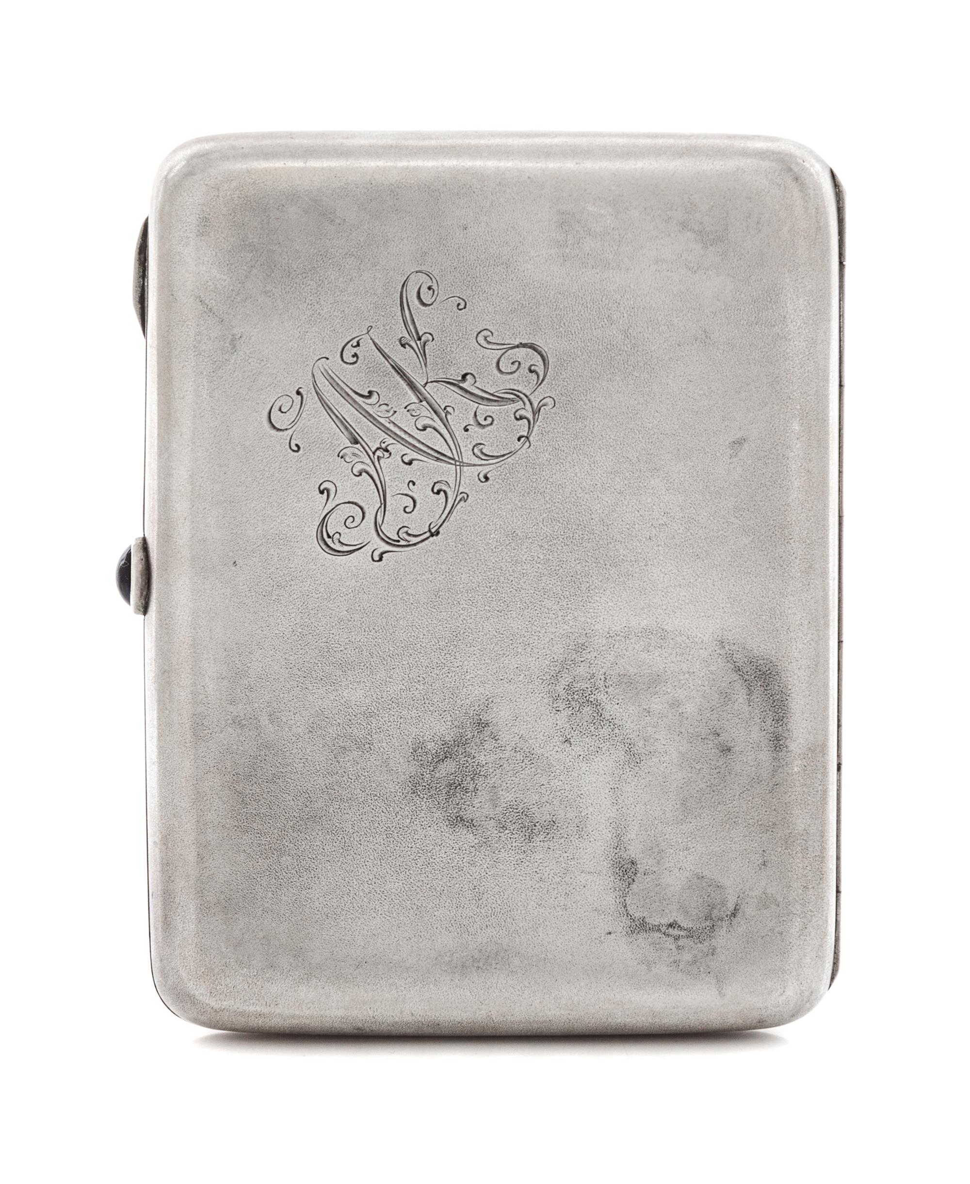A Russian Silver Cigarette Case, Mark of the Fourth Jeweler's Artel, St. Petersburg, early 20th century, the lid with raised decoration