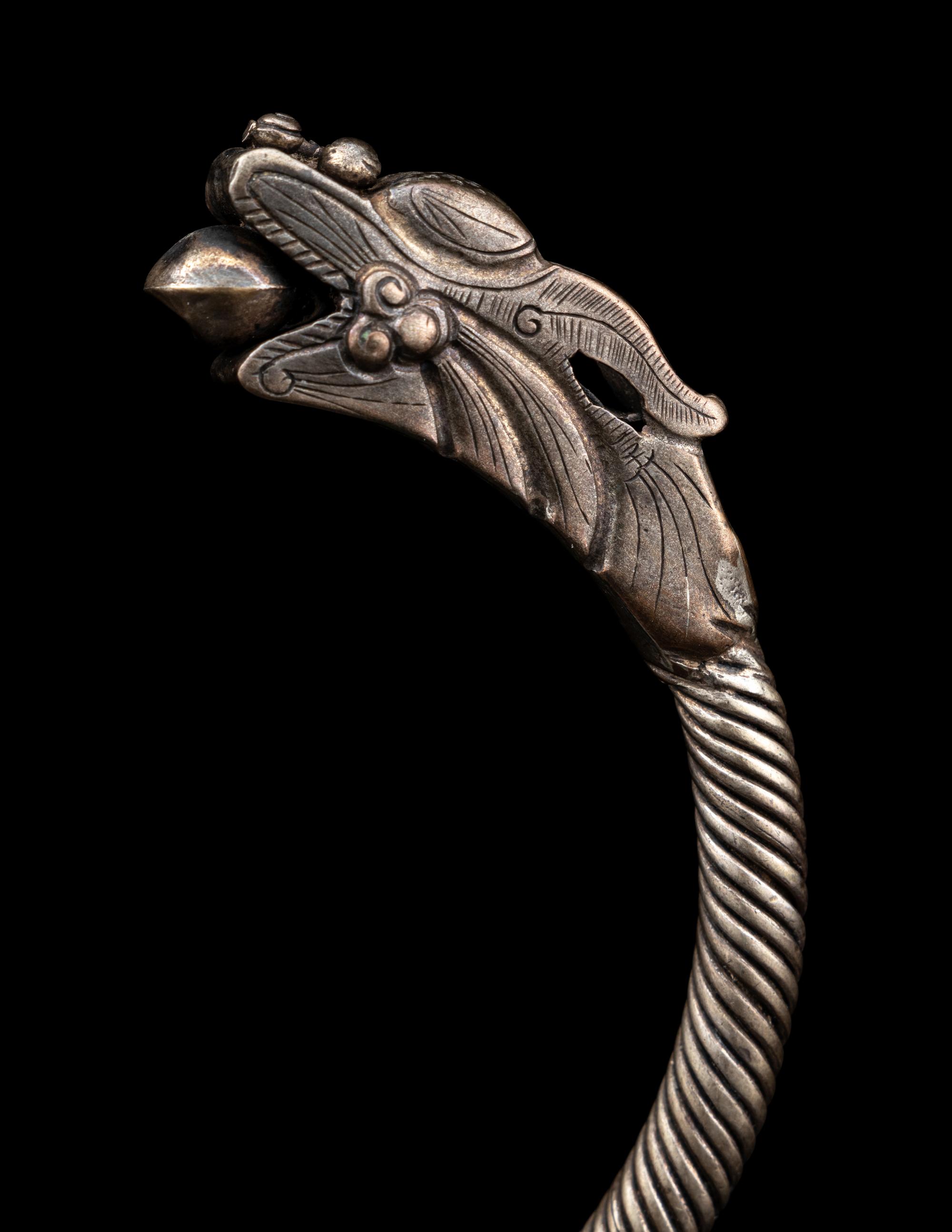 A Pair of Chinese Silver 'Dragon' Bangles