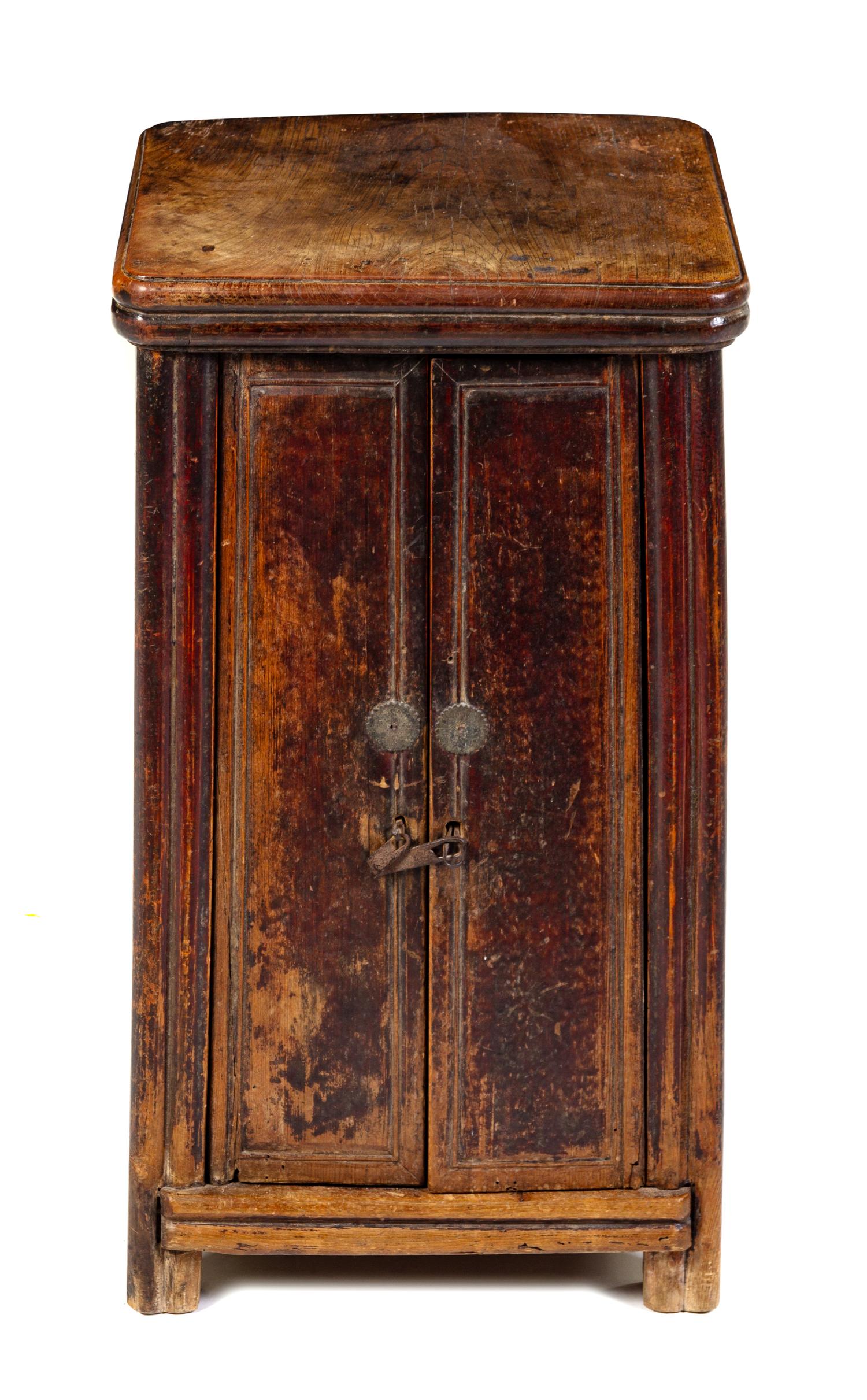 A Chinese Elmwood Cabinet Height 26 3/4 x width 15 x depth 15 inches. — 19TH CENTURY