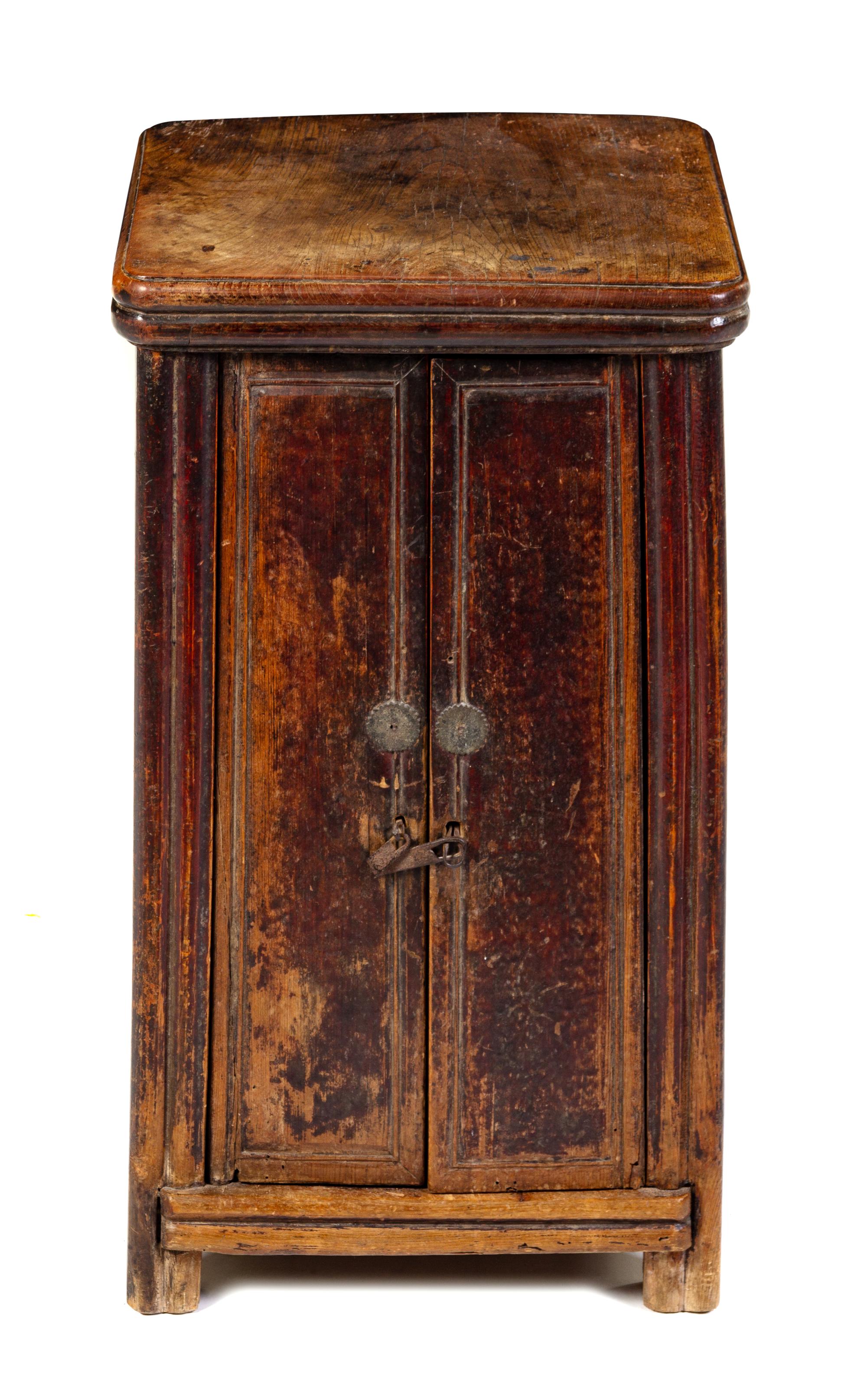 A Chinese Elmwood Cabinet Height 26 3/4 x width 15 x depth 15 inches. — 19TH CENTURY