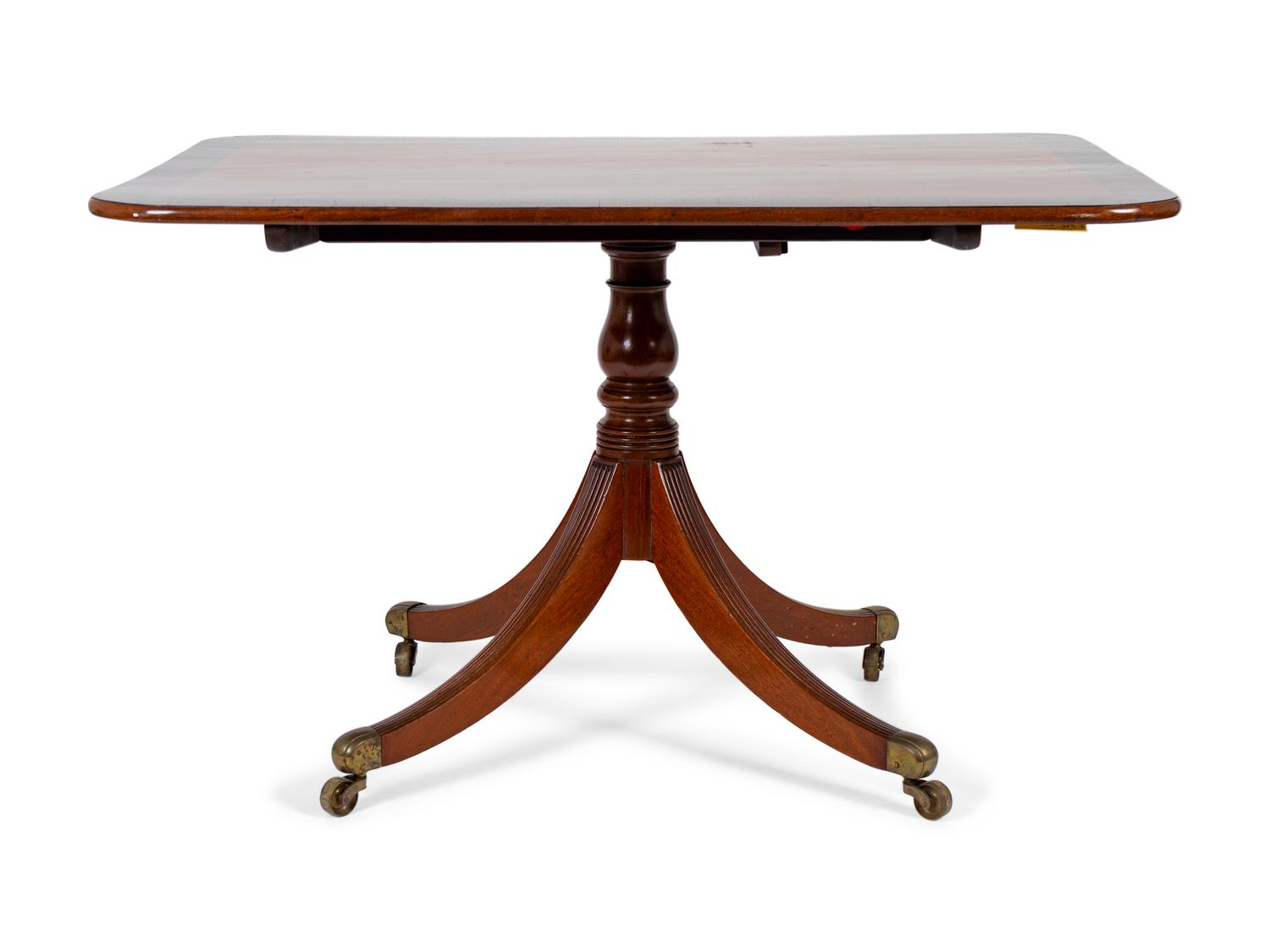 A Regency Cross-banded Mahogany Tilt-top Breakfast Table — EARLY 19TH CENTURY