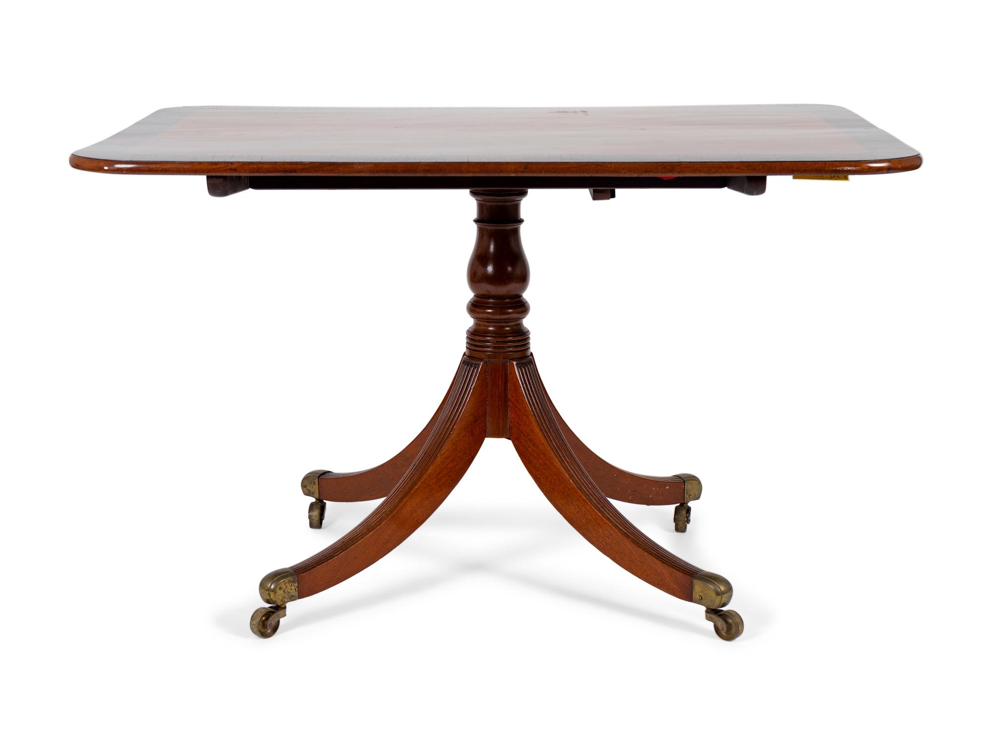 A Regency Cross-banded Mahogany Tilt-top Breakfast Table — EARLY 19TH CENTURY