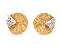 A Pair of 18 Karat Bicolor Gold and Diamond Earclips,