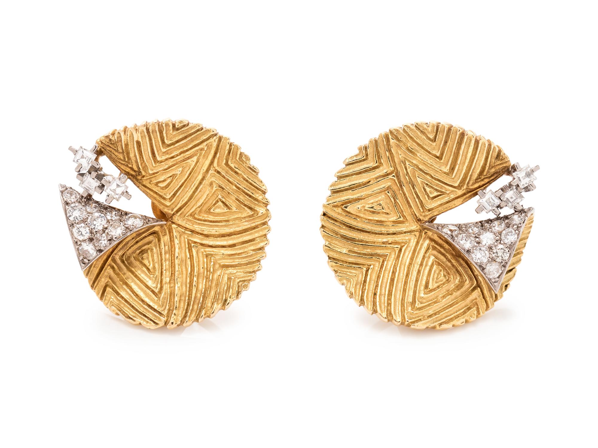 A Pair of 18 Karat Bicolor Gold and Diamond Earclips,