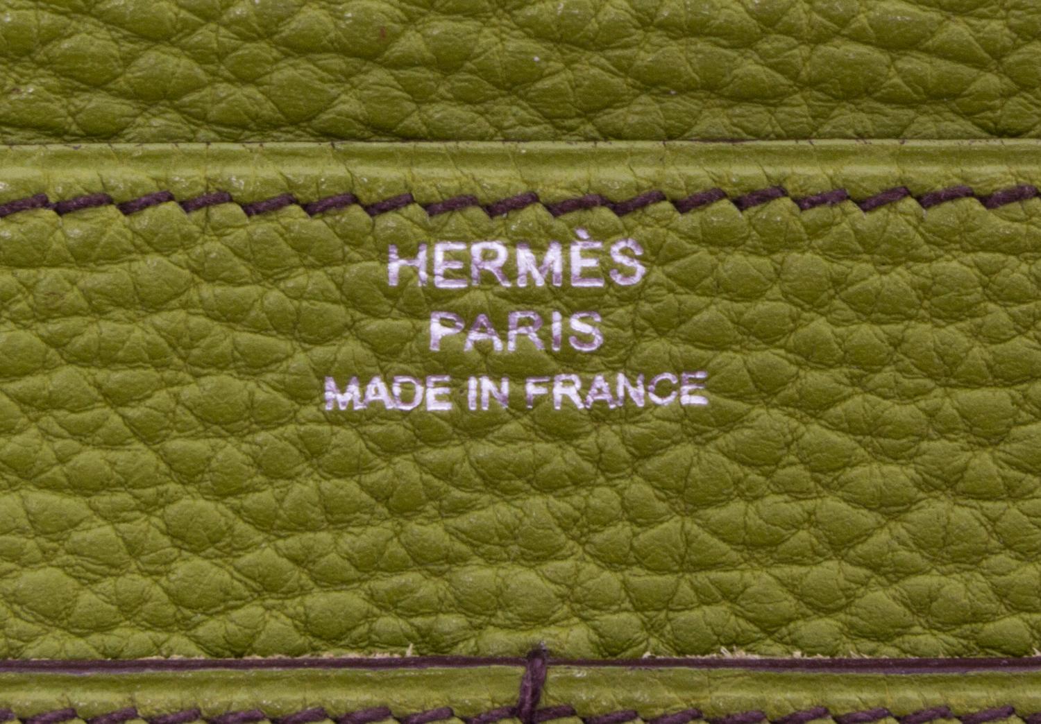 An Hermes Vert Anis Togo Dogon Duo Wallet, 4.9" x 7.9".