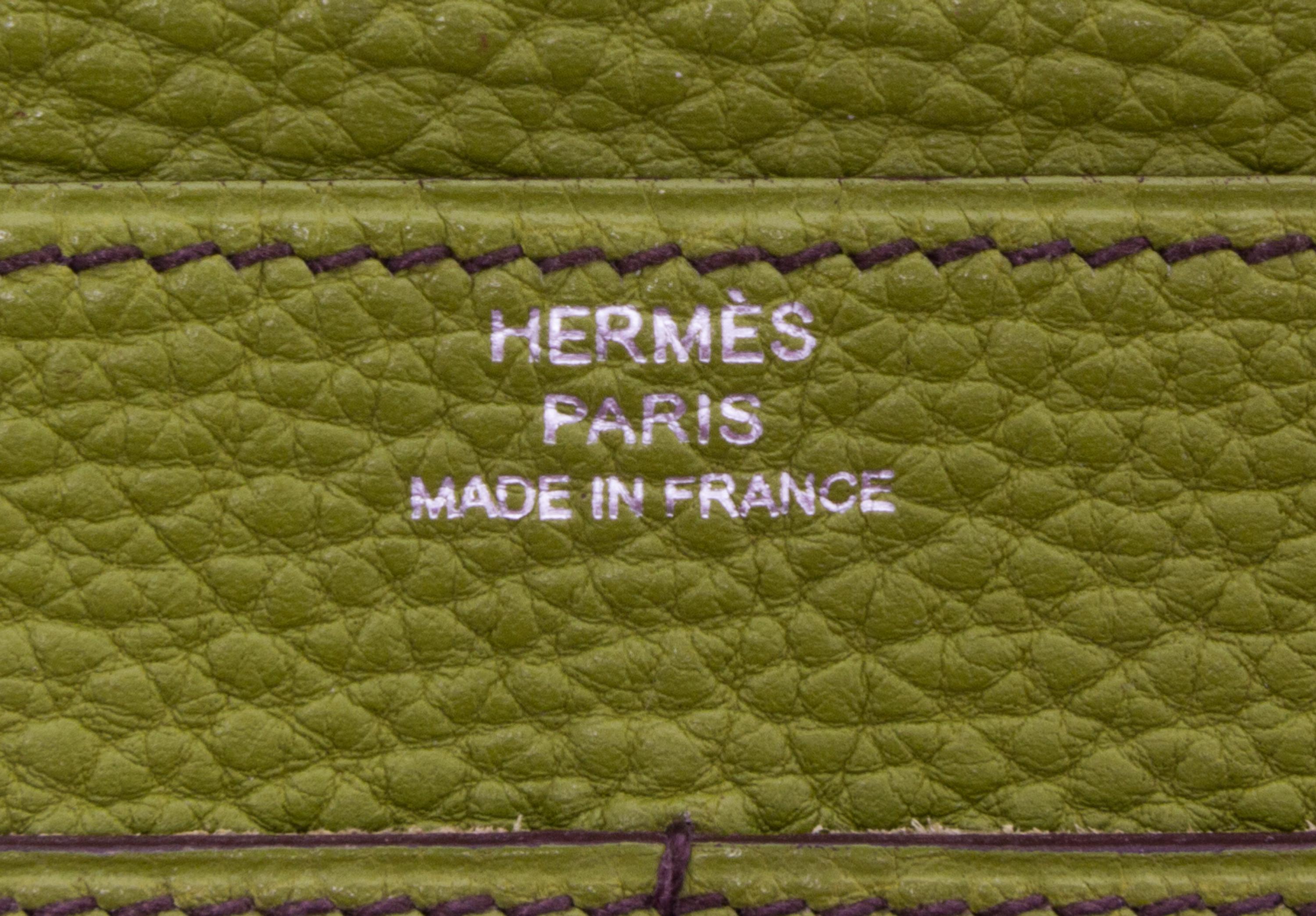 An Hermes Vert Anis Togo Dogon Duo Wallet, 4.9" x 7.9".