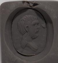 A Neoclassical Gold and Carnelian Pendant with a Male Portrait Head — with a modern gold chain