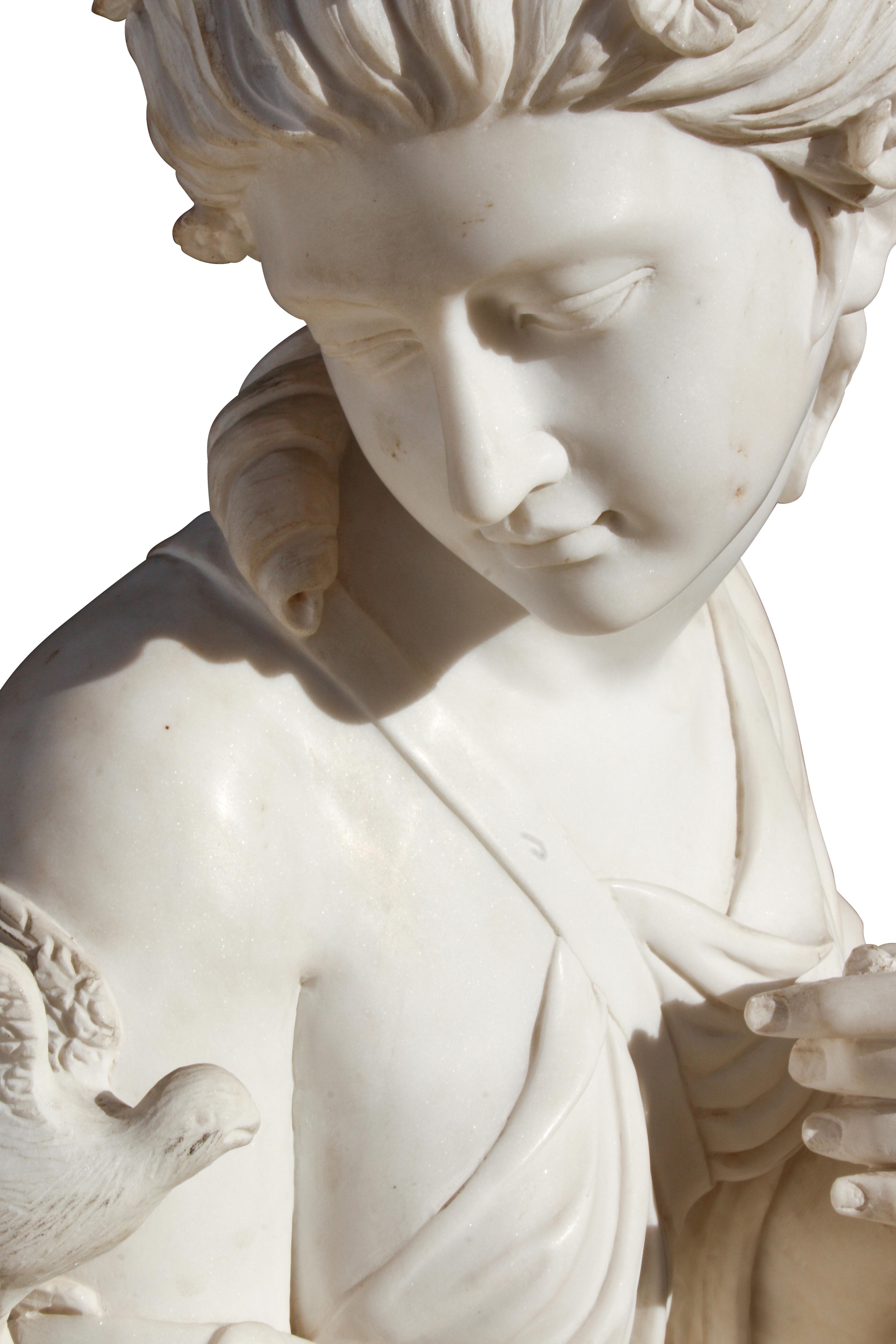 An Italian Marble Figure of a Woman with a Bird