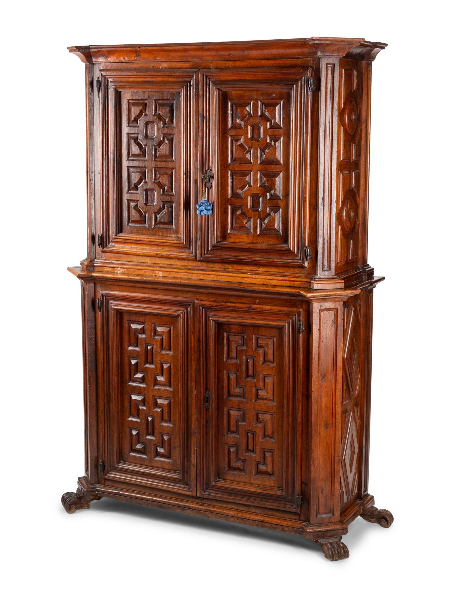 A Continental Walnut Two-Part Cabinet