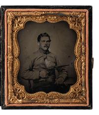 [CIVIL WAR]. Sixth plate tintype of a Confederate cavalryman displaying his Remington revolver.
