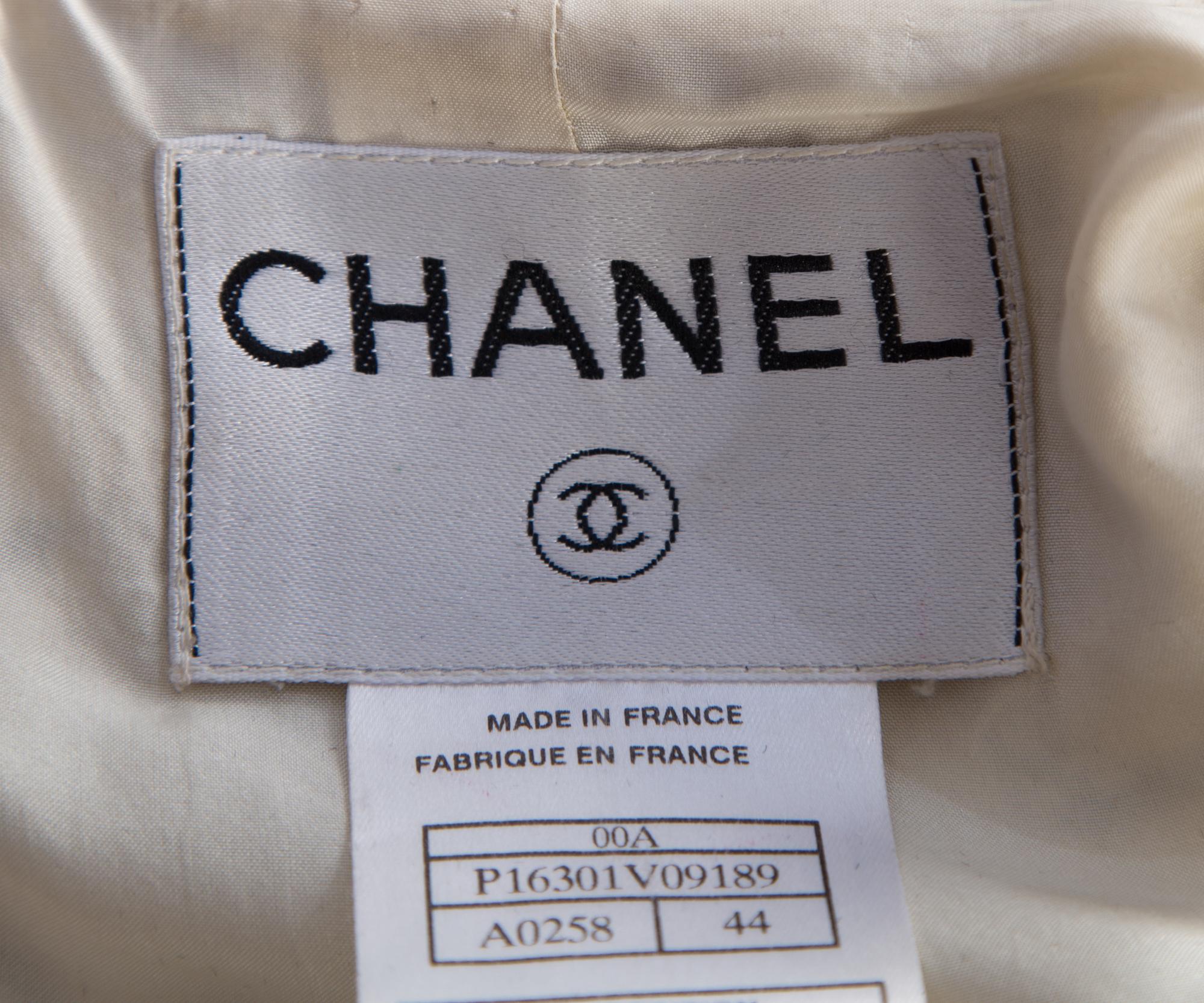 A Chanel Black and Cream Wool Boucle Coat, Coat size 44; Belt 39".