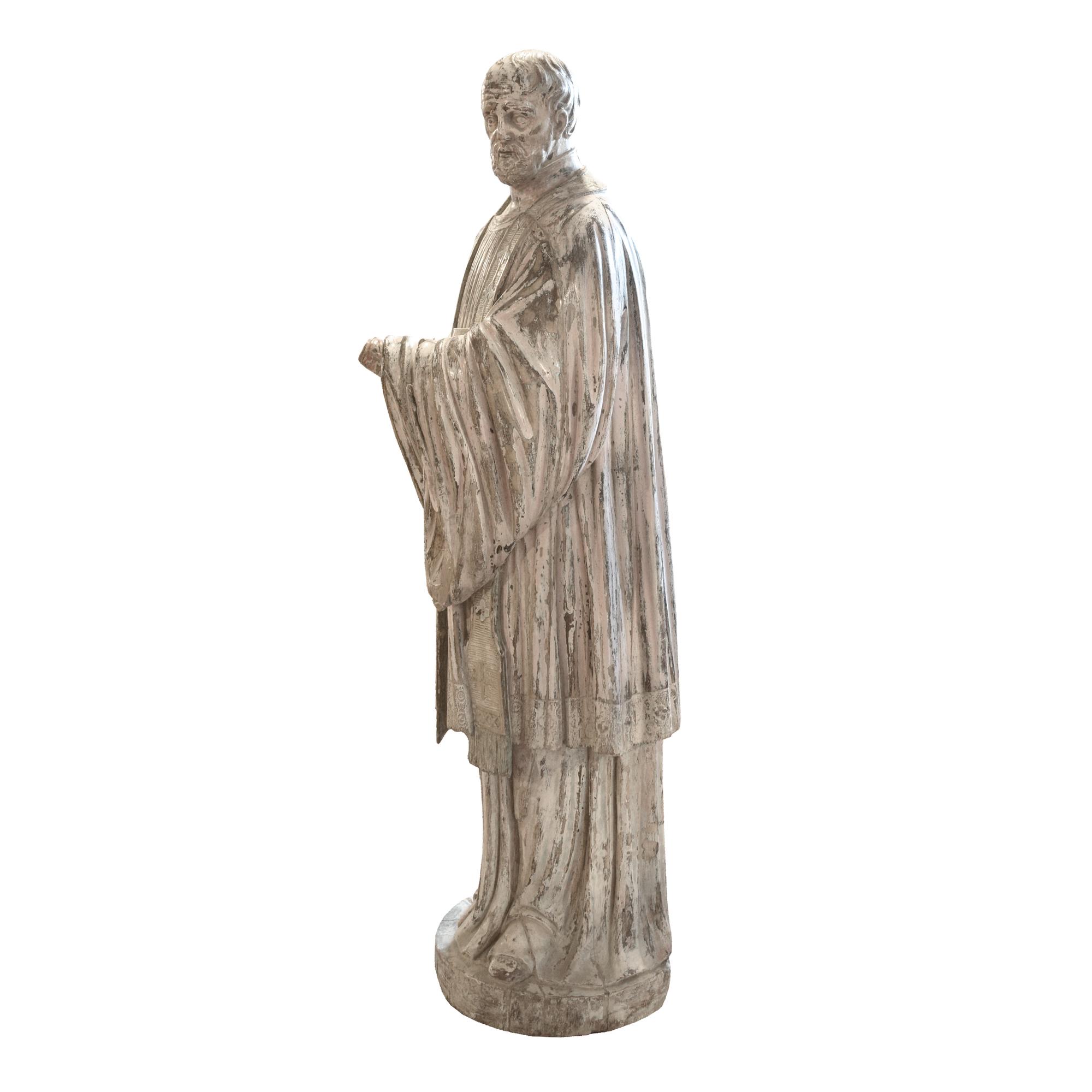 A Carved Wood Figure of a Saint 17" W x 12" D x 44" H — Europe, 19th Century