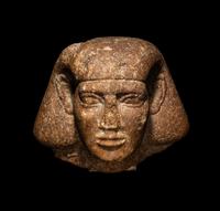 An Egyptian Granite Head of a Scribe