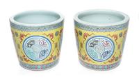 A Pair of Chinese Famille Rose Porcelain Cache Pots Height 13 1/4 inches. — 19TH CENTURY