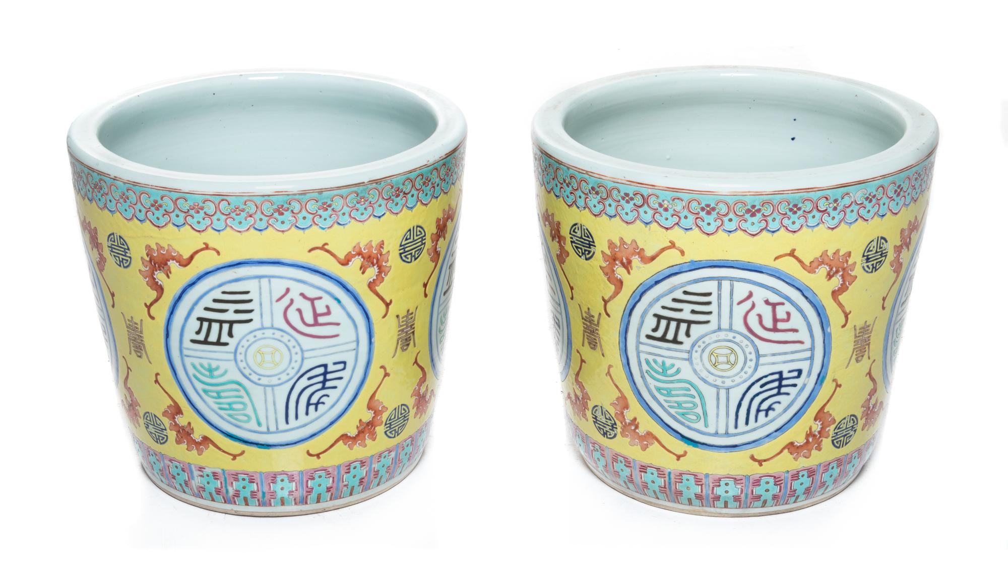A Pair of Chinese Famille Rose Porcelain Cache Pots Height 13 1/4 inches. — 19TH CENTURY