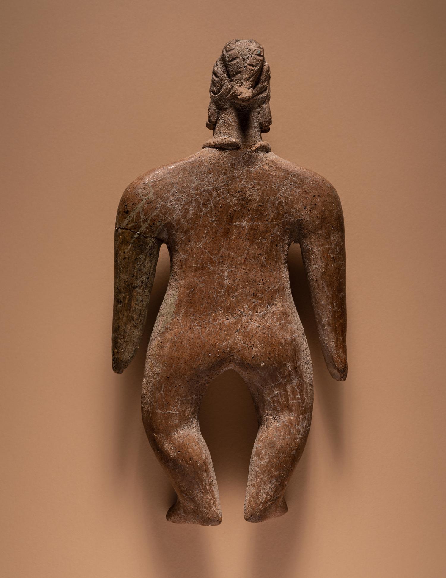 A Colima Standing Female Figure