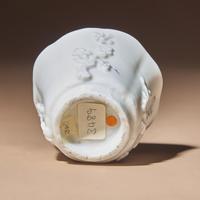 A Chinese Blanc-de-Chine Porcelain Cup, 17th Century — 明末清初 德化白瓷貼塑梅紋花口杯