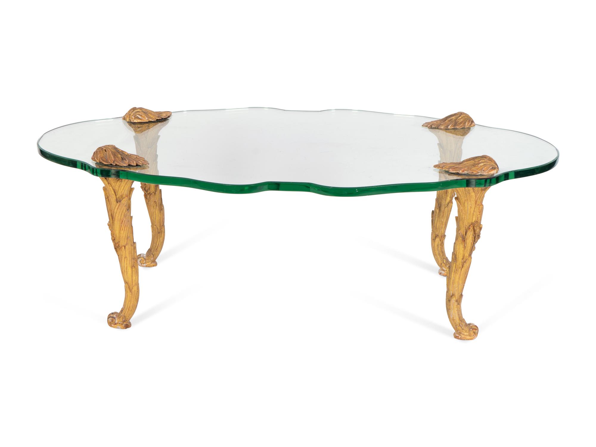 A French Carved Giltwood and Cartouche-form Glass Coffee Table — Circa 1940