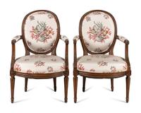 A Pair of Louis XVI Walnut Fauteuils