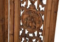 A Chinese Carved Hardwood Four-Panel Floor Screen