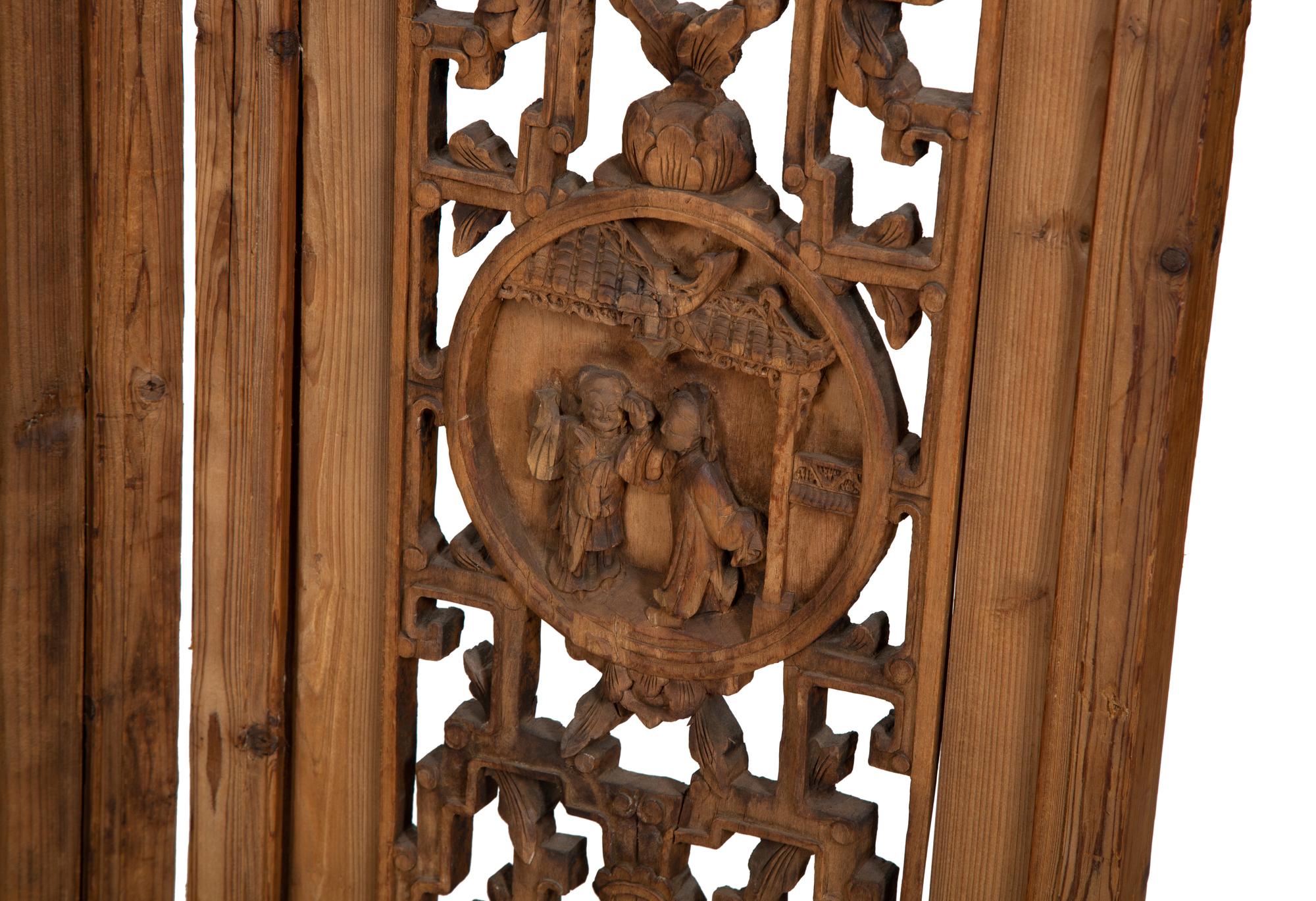 A Chinese Carved Hardwood Four-Panel Floor Screen