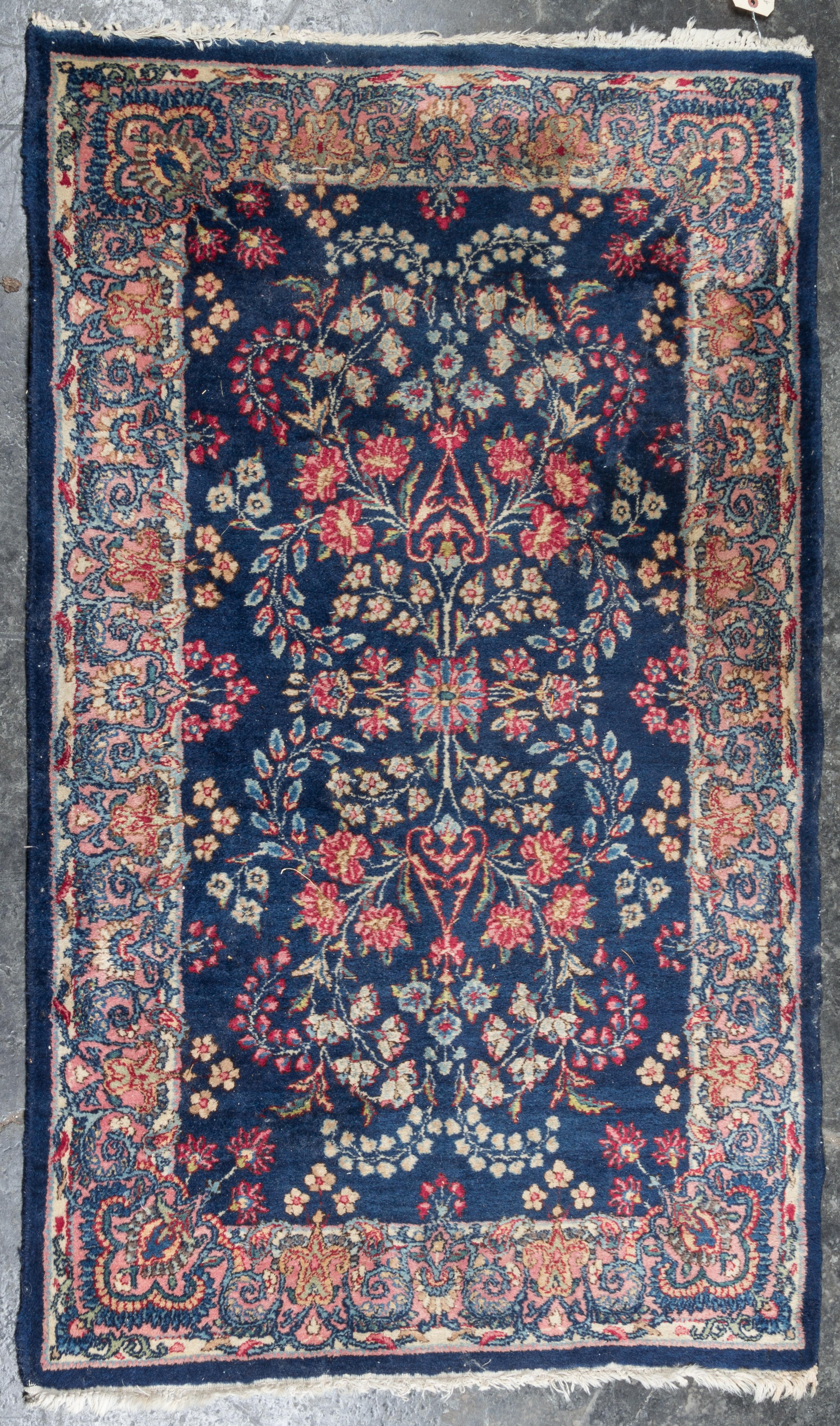 A Persian Wool Rug 4 feet 11 inches x 3 feet 1 inch. — FIRST HALF 20TH CENTURY