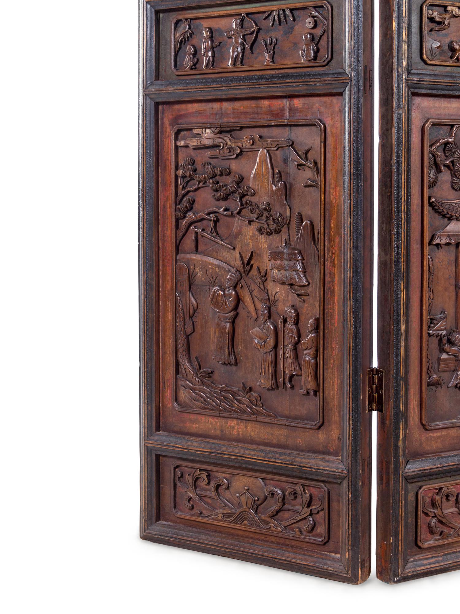 A Chinese Carved Hardwood Four-Panel Floor Screen