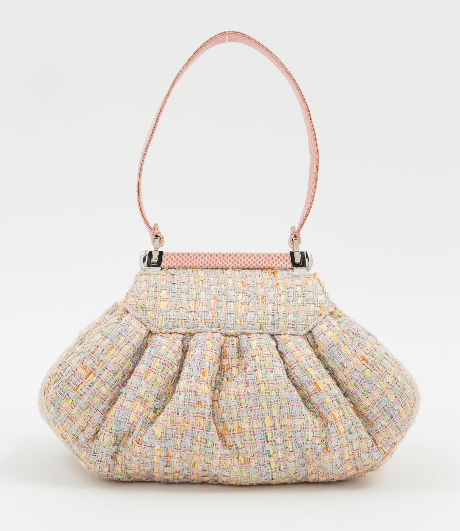 A Judith Leiber Boucle and Crystal Floral Motif Handbag, 7.5" X 4.5" X 3.5"; Handle drop: 4".
