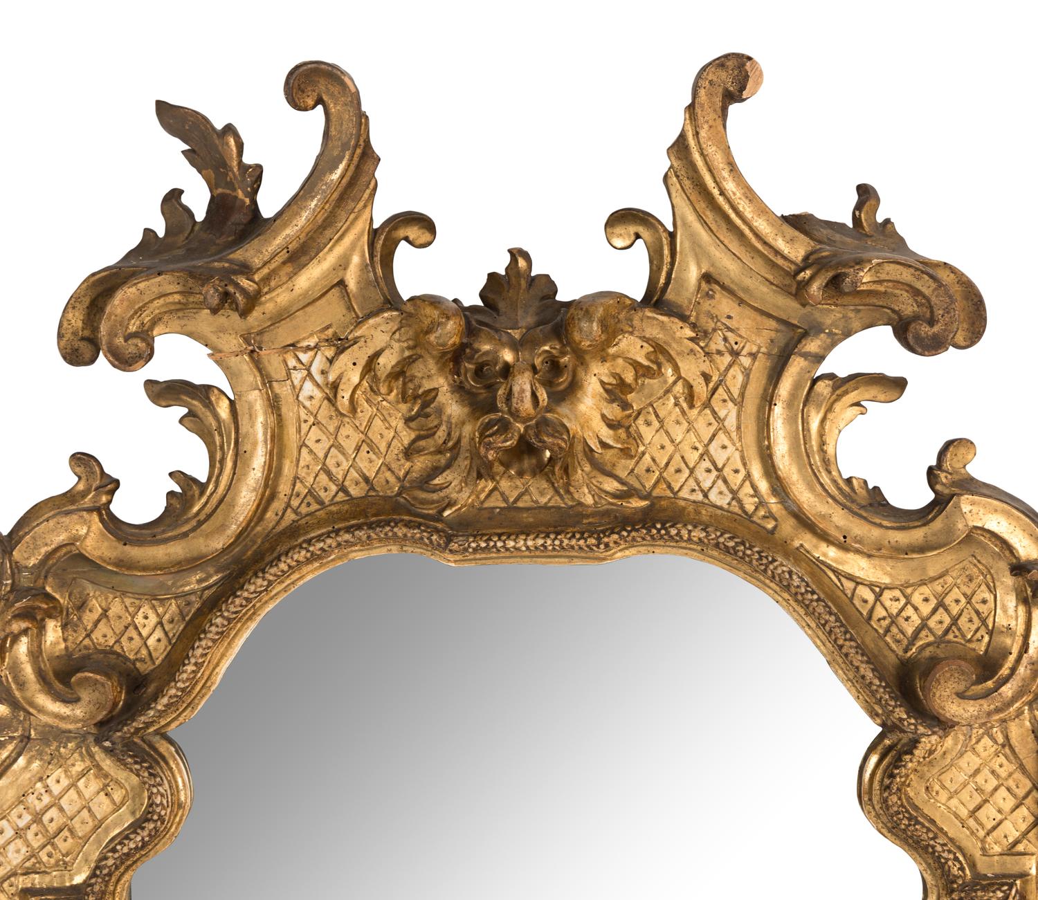 An Italian Rococo Carved Giltwood Mirror