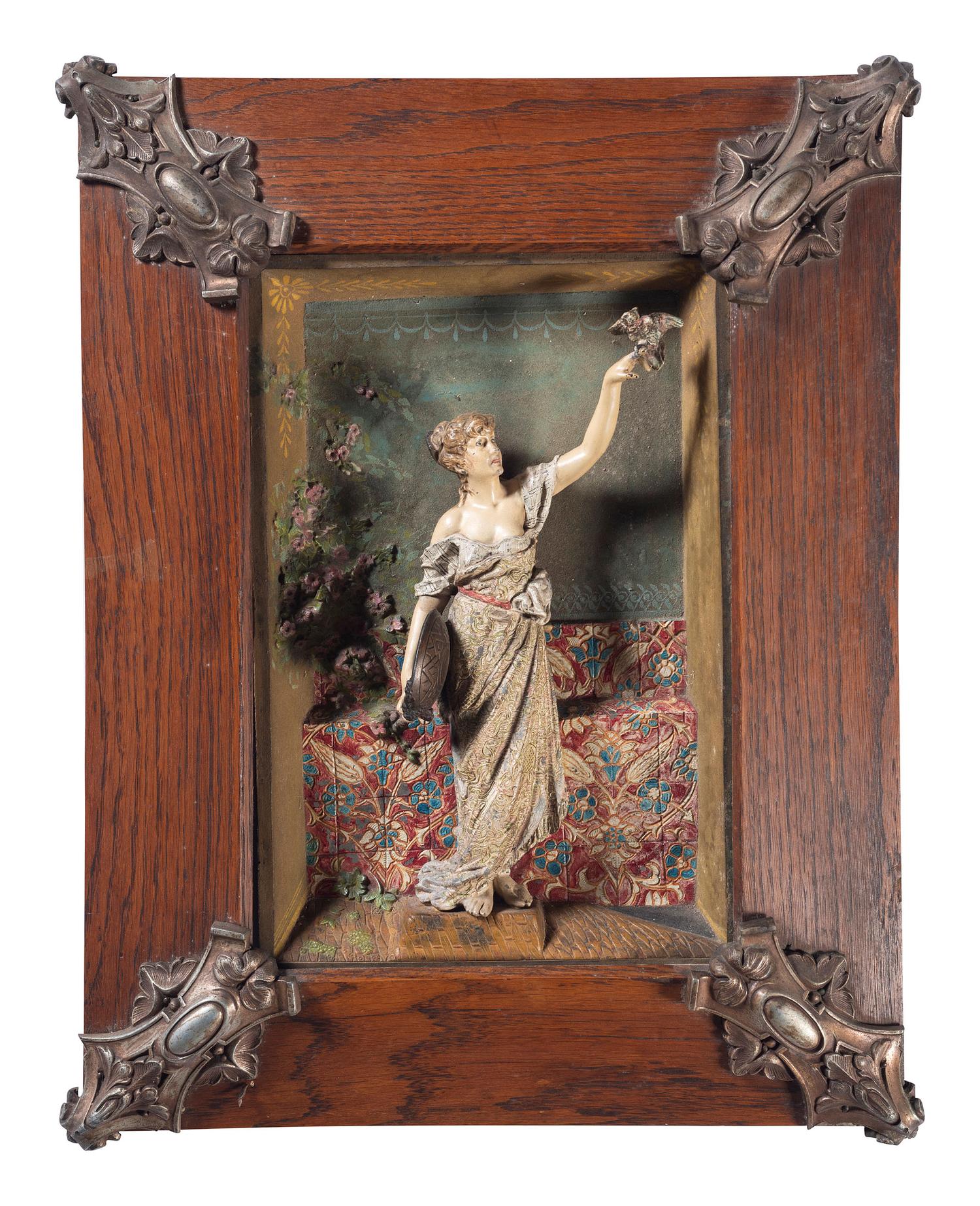 A Victorian Painted Cast Iron Framed Wall Sculpture