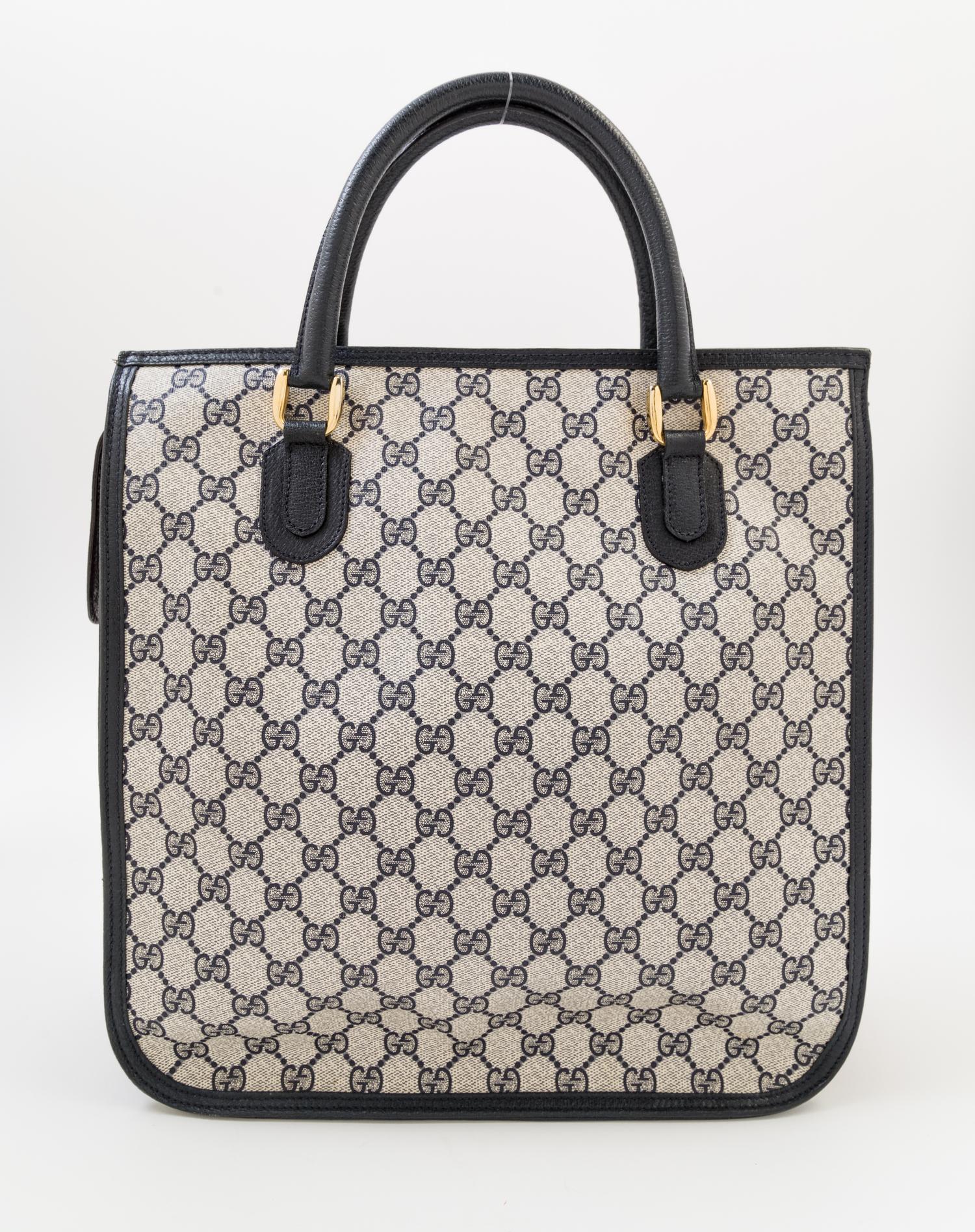 A Gucci Blue Monogram Canvas Square Tote, 12" x 13" x 4"; Strap drop: 20".
