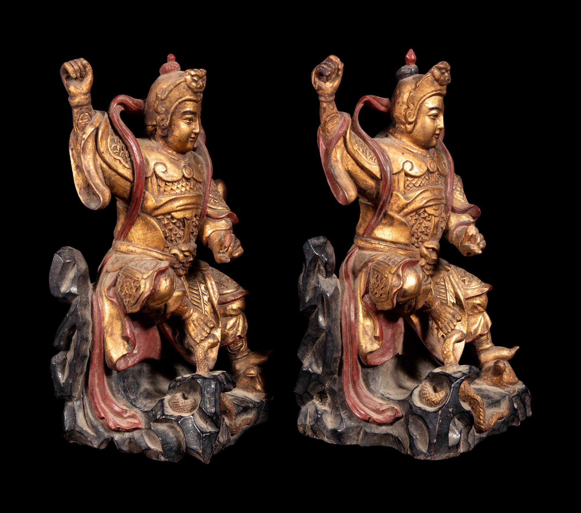 A Pair of Small Chinese Gilt and Red Lacquered Wood Figures of Guardians
