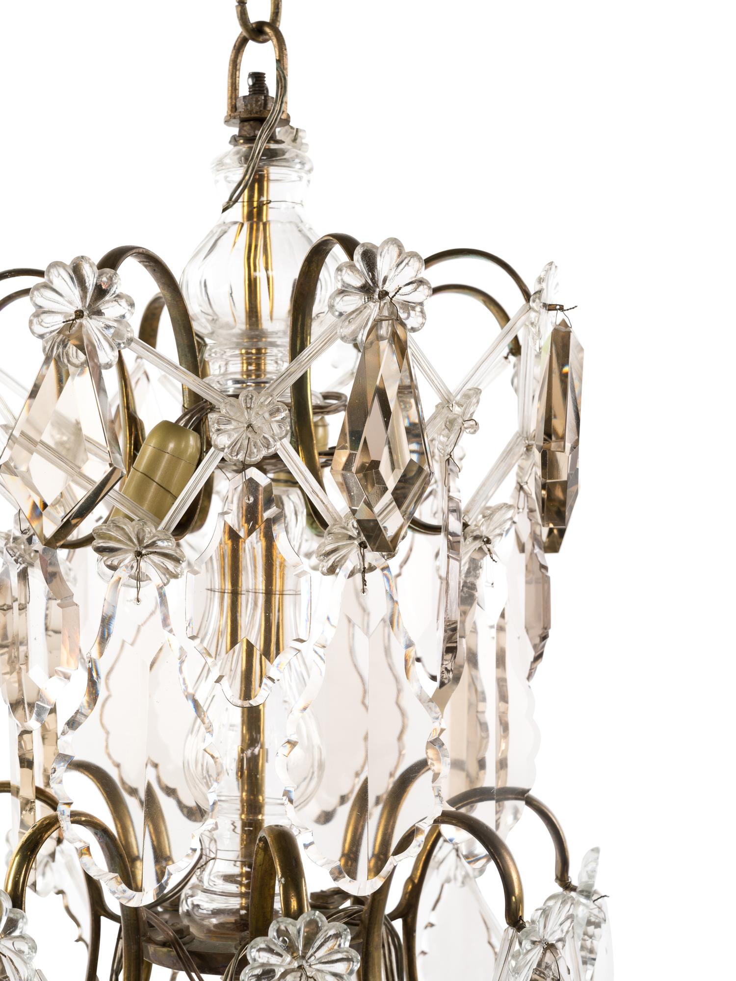 A Swedish Brass and Glass Eight-Light Chandelier