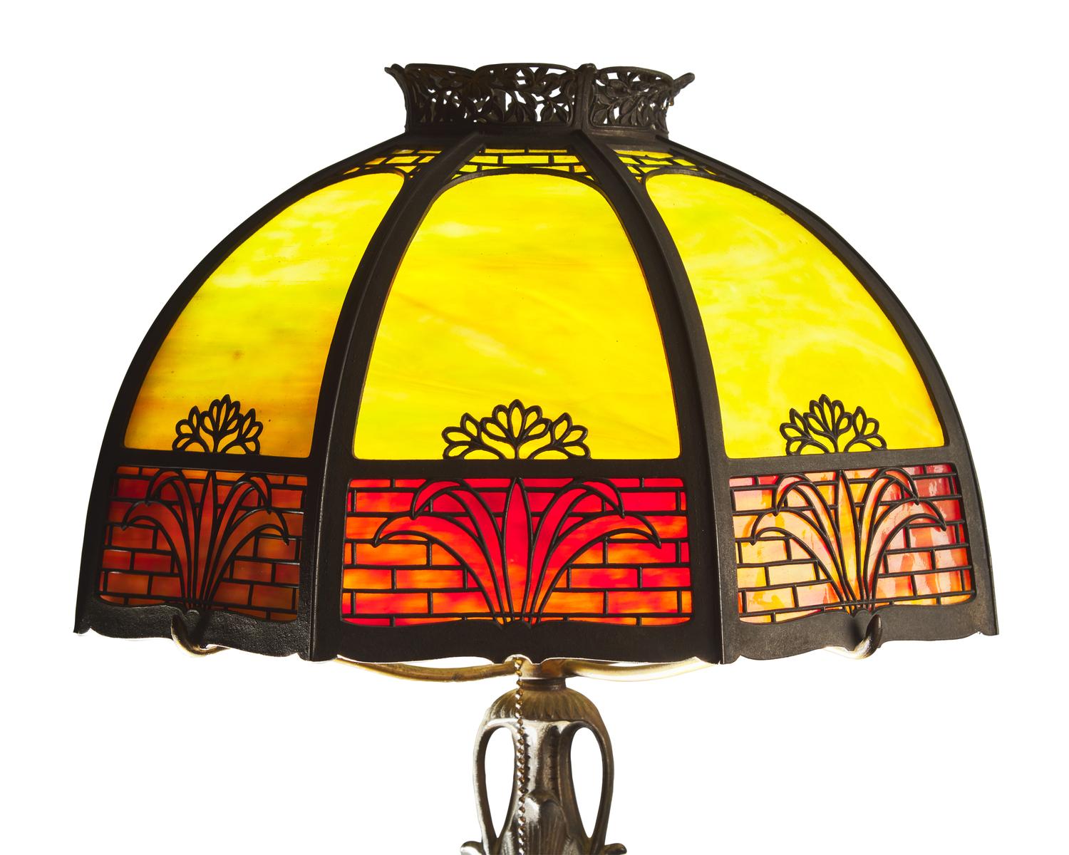 An American Arts & Crafts brass and slag glass table lamp, circa 1920