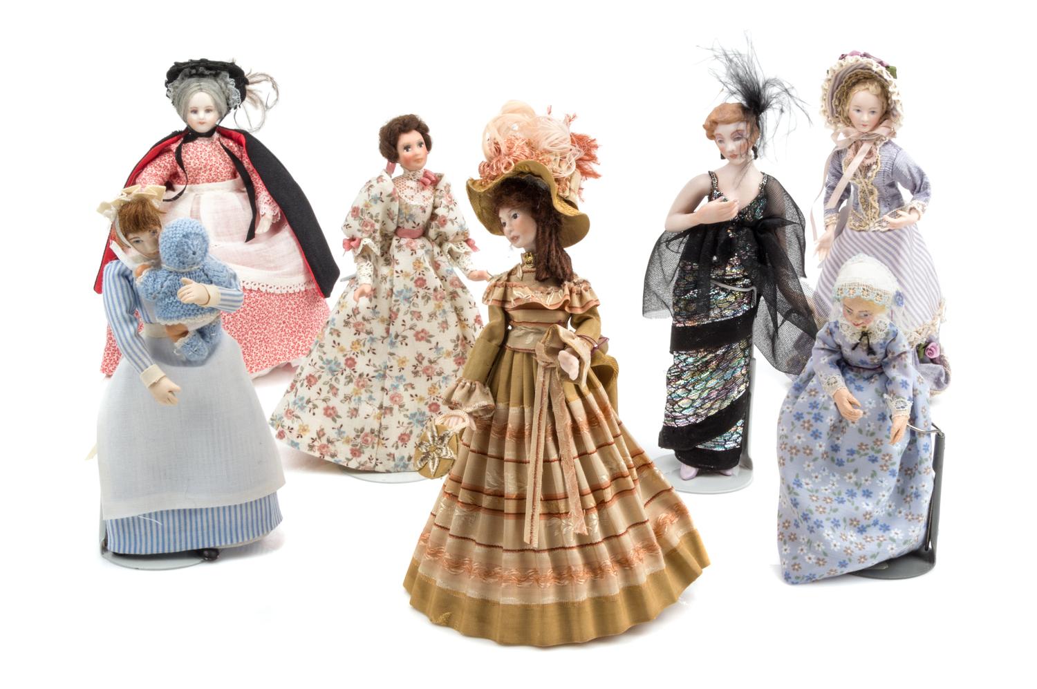A Group of Seven Bisque Porcelain and Ceramic Dolls Height of tallest 6 3/4 inches.