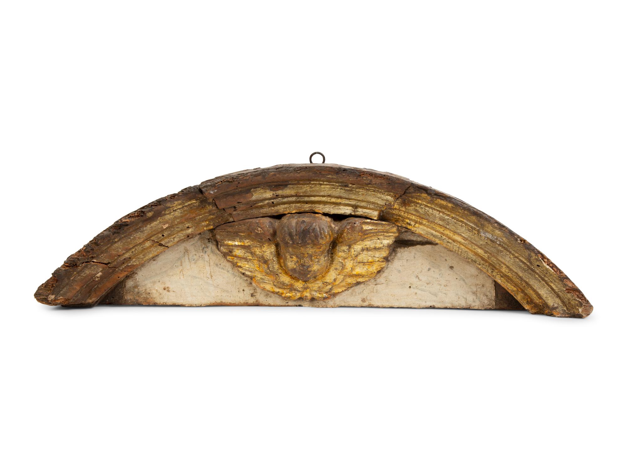 A Florentine Carved and Parcel Gilt Pediment — 17TH CENTURY