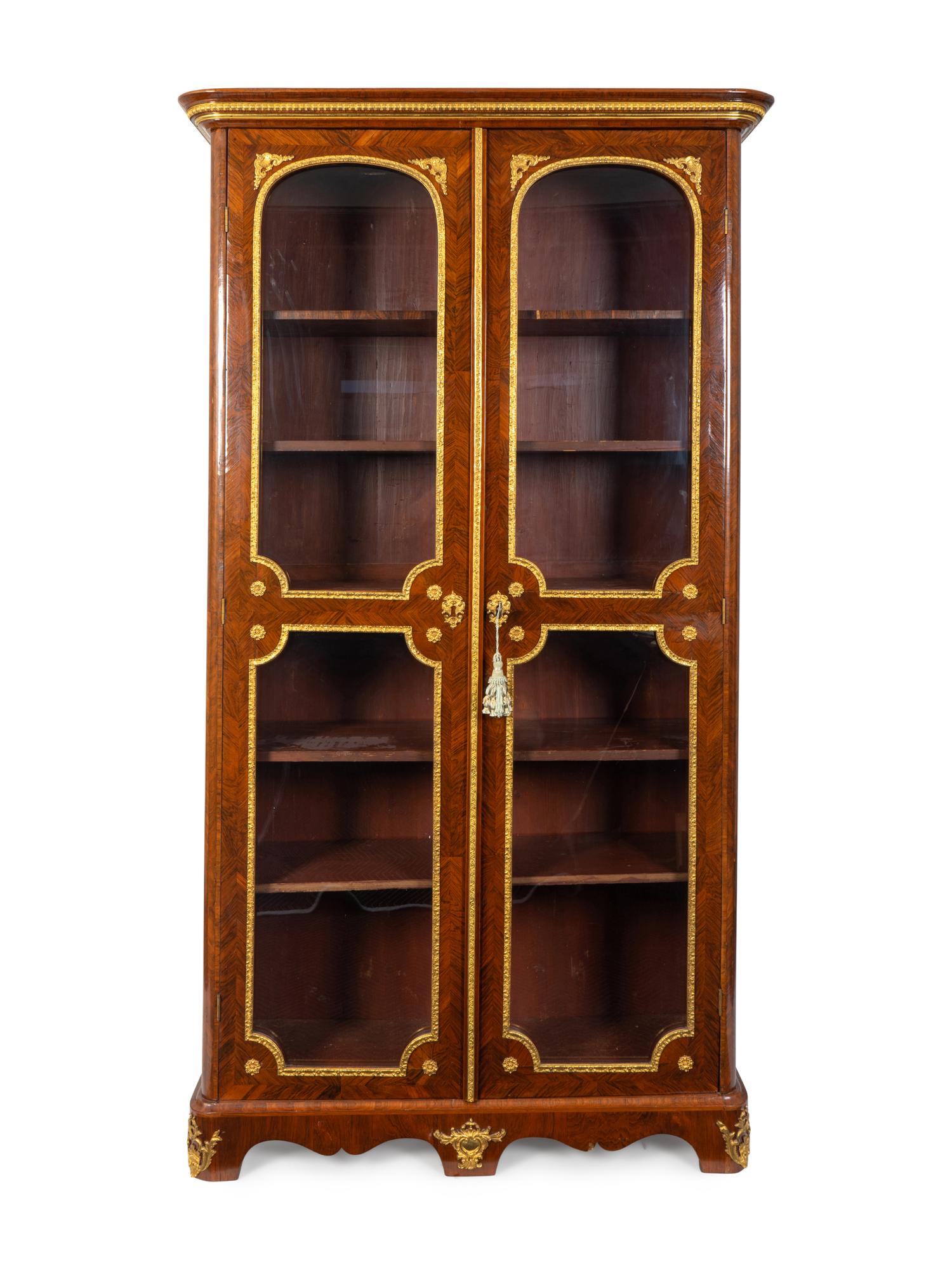 A Regence Gilt-Bronze-Mounted Palisandre Bibliothèque — FIRST QUARTER 18TH CENTURY