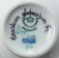 A Set of Twelve Royal Copenhagen Flora Danica Cups and Saucers Height of teacup 2 5/8 inches. — 20TH CENTURY
