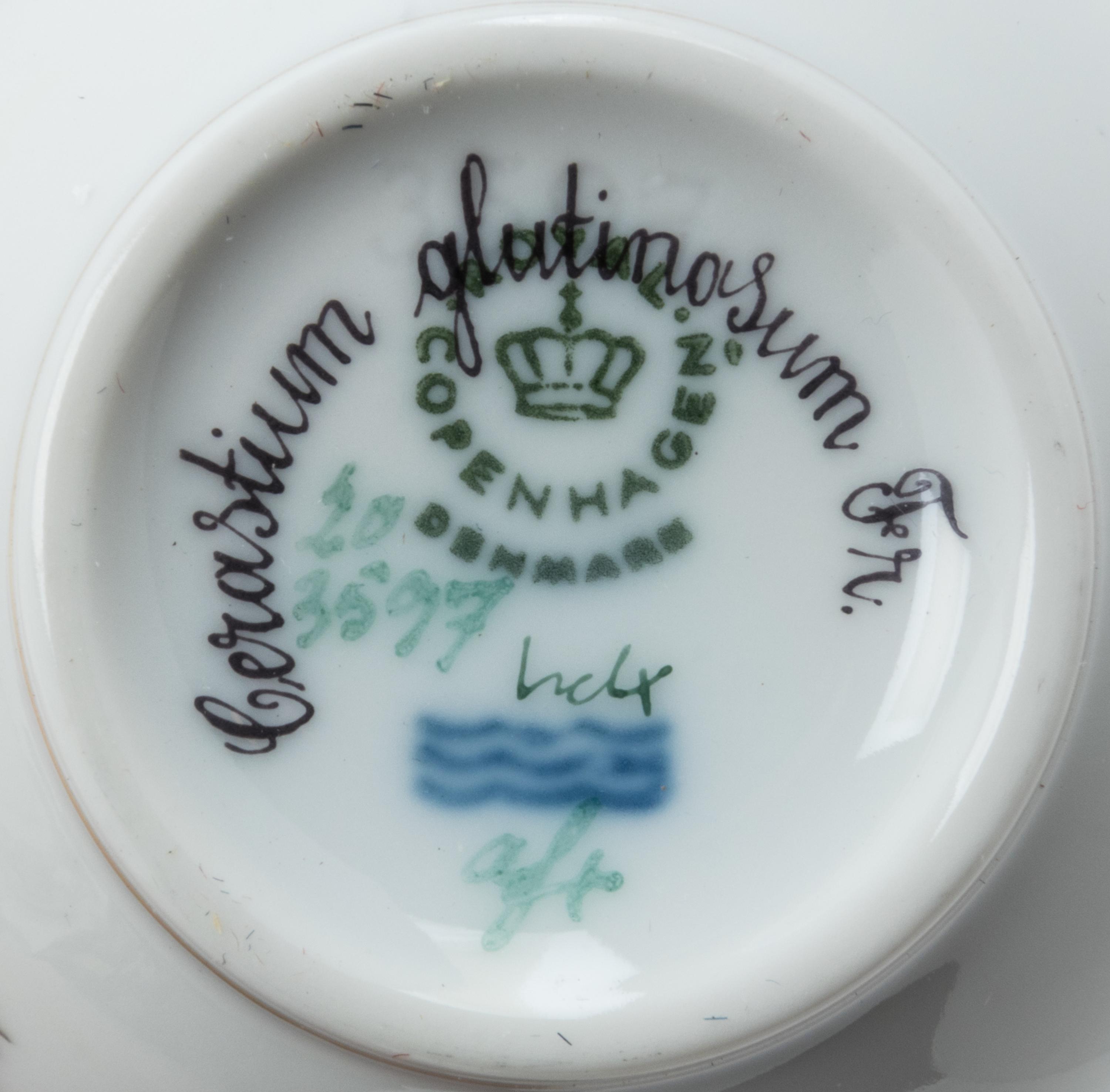 A Set of Twelve Royal Copenhagen Flora Danica Cups and Saucers Height of teacup 2 5/8 inches. — 20TH CENTURY